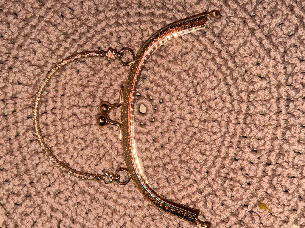 Antikk oval metallramme til veske