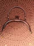 Antikk oval metallramme til veske