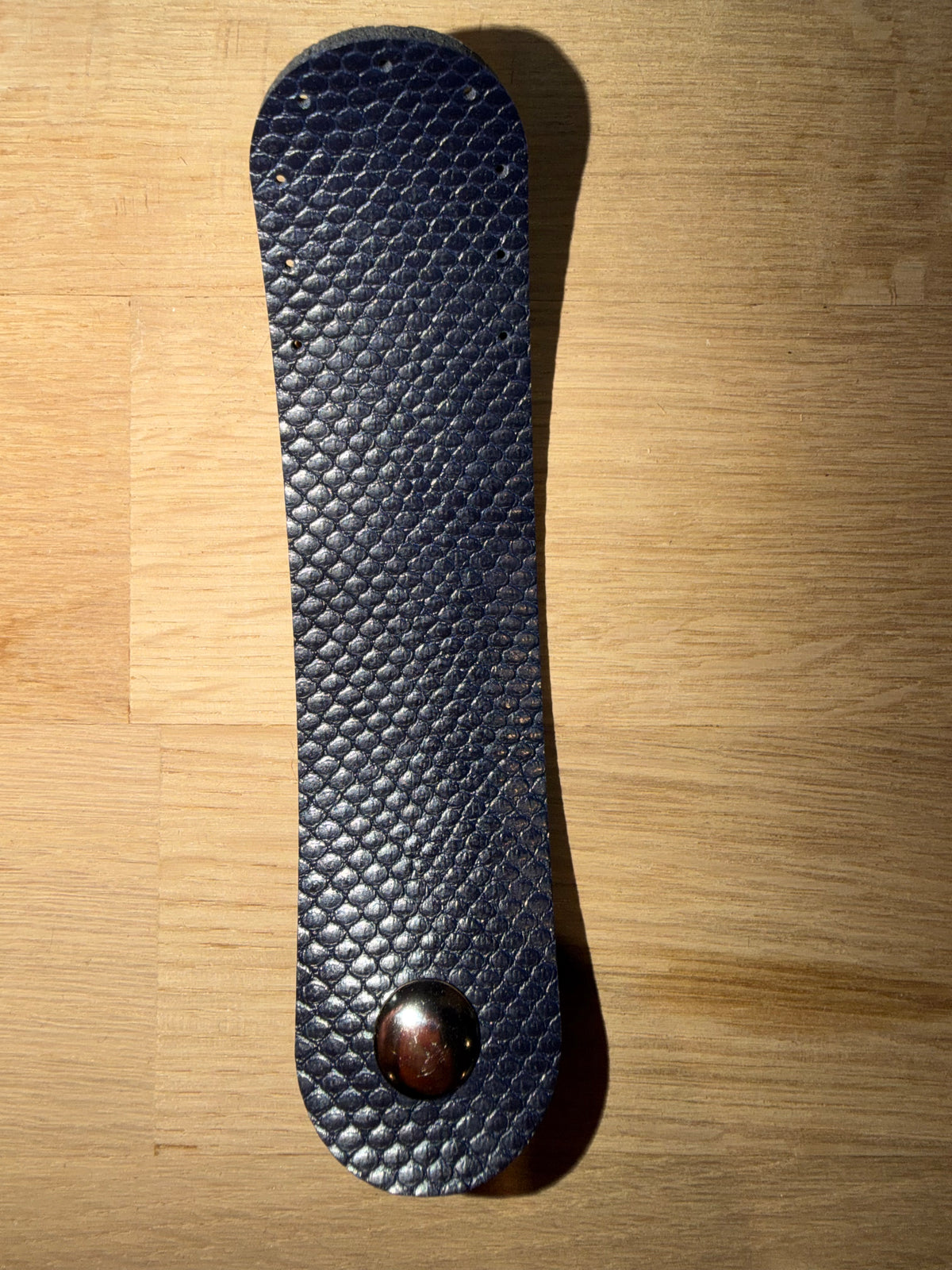 PU skinnflaps lukkemekanisme