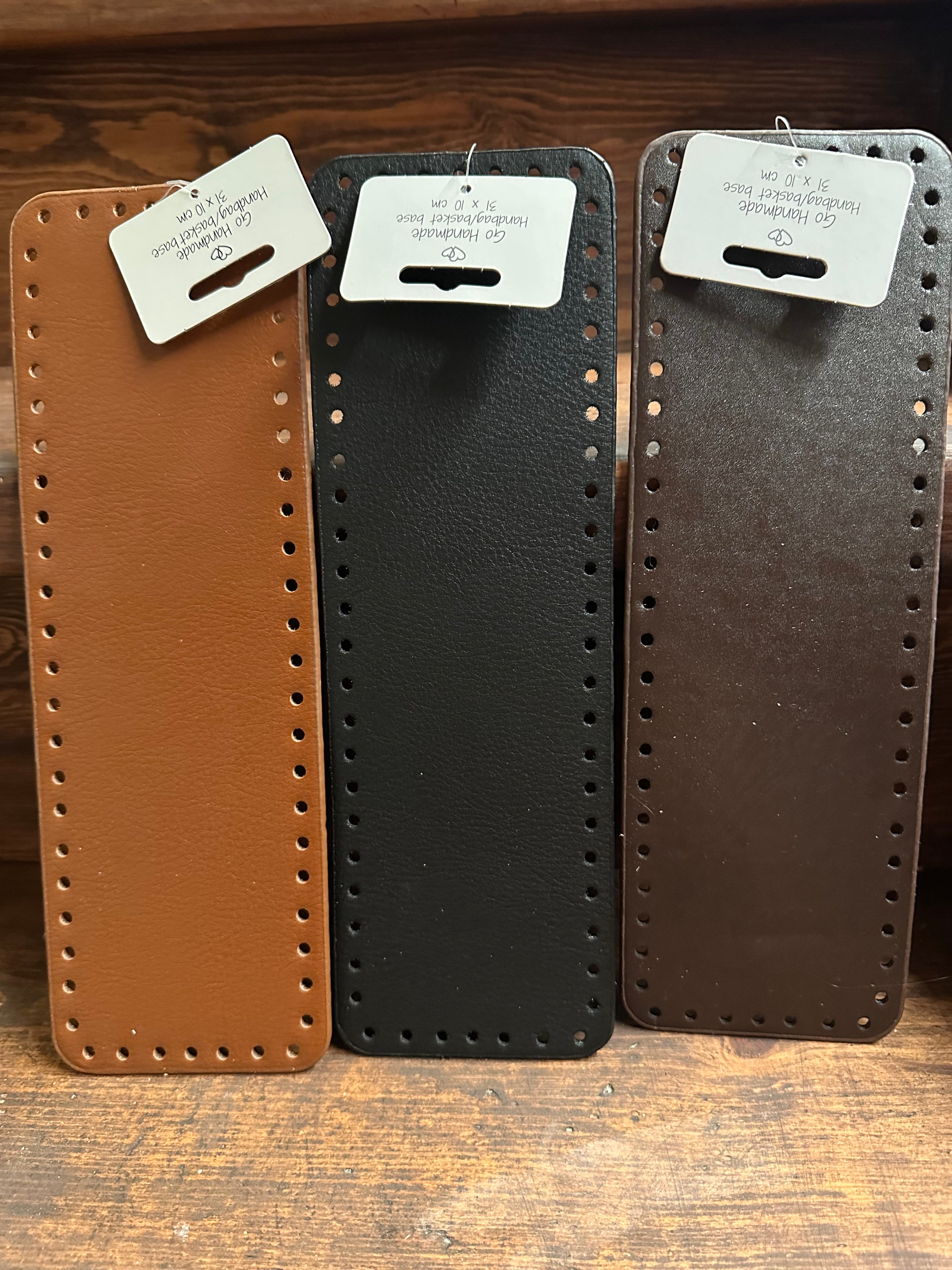 Lær- og skinnbunnar til vesker og korger